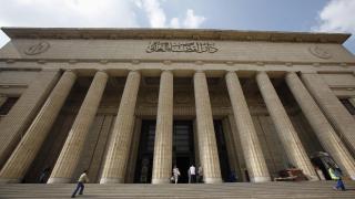 A view of the High Court of Justice in Cairo November 1, 2011. The words read, " High Court of Justice." Egypt's judiciary has emerged from the uprising that toppled Hosni Mubarak as one of the few institutions retaining some credibility, but the weight of public expectations may have forced it to take on too much, far too fast. Picture taken November 1, 2011. To match Analysis EGYPT-JUDICIARY REUTERS/Mohamed Abd El-Ghany (EGYPT - Tags: POLITICS CRIME LAW)