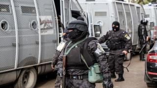 GIZA, EGYPT - JANUARY 25: Police take security measueres to prevent the protests against military regime on the 5th anniversary of Egyptian revolution in 2011, in Haram Neighborhood in Giza, Egypt on January 25, 2016. Mohamed Morsi was ousted from the office with a military coup, led by General Abdel Fattah el-Sisi after the June 2013 Egyptian protests and in May 2015. Morsi was issued a preliminary death sentence. (Photo by Ibrahim Ramadan/Anadolu Agency/Getty Images)