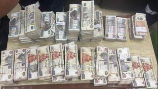 ضبط موظف سرق 400 ألف جنيه من شركة بالدقى وألقاها فى القمامة